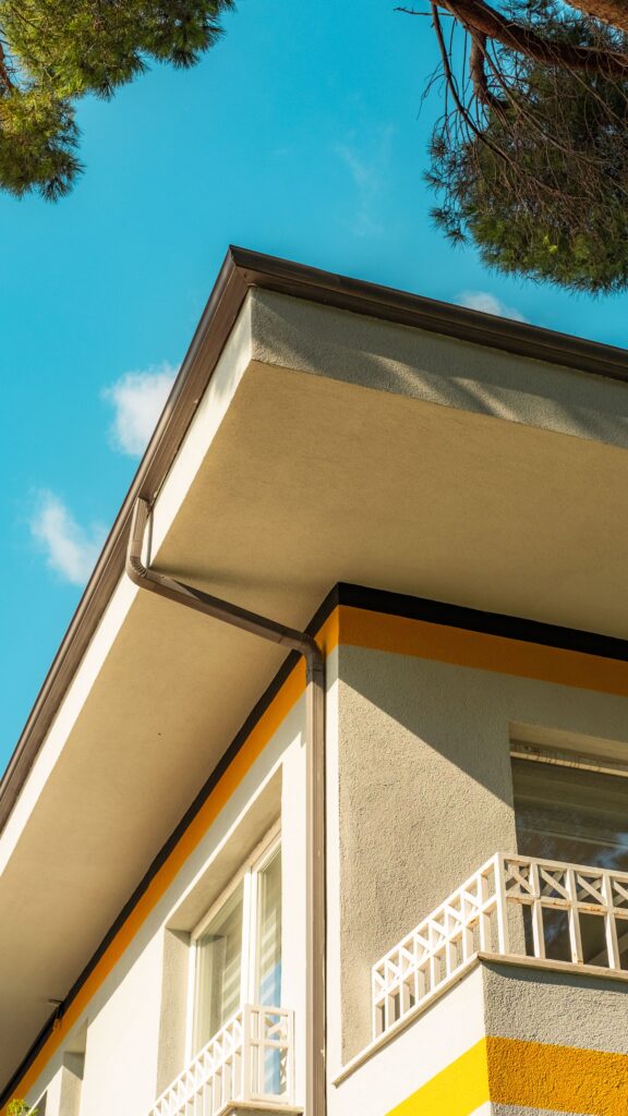 Modern house exterior painting with balconies and a vibrant facade Cincinnati ohio Alabaster Contracting Solutions
